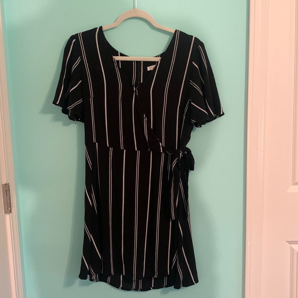 Short black dress with white stripes, size medium